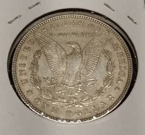 1885 MORGAN SILVER DOLLAR AU
