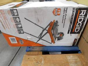 lot 44 image: RIDGID 9 Amp Corded 7 in. Wet Tile Saw with Stand