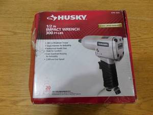 lot 85 image: Husky 12 in. 300 ft. lbs. Impact Wrench