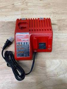 lot 5 image: MILWAUKEE M12 and M18 12-Volt18-Volt Lithium-Ion Multi-Voltage Battery Charger