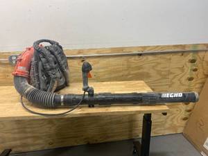 lot 86 image: ECHO 216 MPH 517 CFM 58.2cc Gas 2-Stroke Cycle Backpack Leaf Blower with Tube Throttle