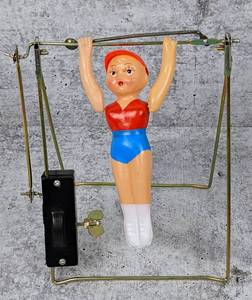 lot 30 image: Vintage 1970s Single Bar Exercise, Mechanical Wind up Toy