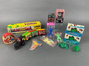 lot 147 image: An Assortment of Vintage Toys Ox OP Keychain, Tin Litho Wind Up Train Toy & More
