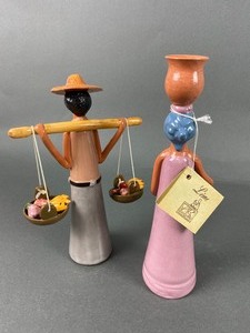 lot 182 image: Set of Two Lime Clay Faceless Dolls from the Dominican Republic - Going to Market
