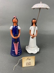lot 183 image: Pair of Artesania Lime faceless figurine Dominican Republic handmade clay dolls  - Debutantes with Parasols.