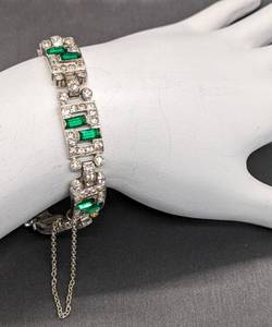 lot 116 image: Vintage Crown TRIFARI Sterling and Crystal Tennis Bracelet