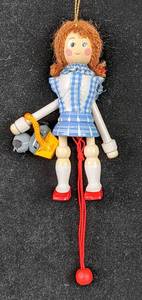 lot 112 image: Kurt S. Adler Full Set of Wizard of Oz Wooden Pull String Ornaments 1980 & 1983