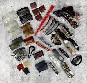 lot 187 image: A Collection of Vintage Hair Clips, Combs, and Barrettes LAURA