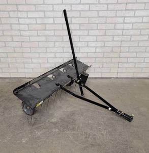 lot 613 image: Brinly Pull Behind Lawn Dethatcher - 40 Wide