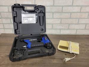 lot 627 image: Campbell Hausfeld 1.25 Pneumatic Brad Nailer and RadioShack Weather Radio