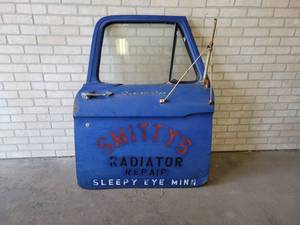 lot 643 image: 1950s Ford Custom Cab Door - Smittys Radiator Repair - Sleepy Eye MINN - Great Wall Hanger