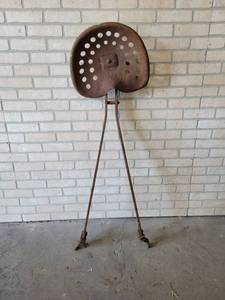 lot 645 image: Antique Stamped Steel Farm Implement Seat w Bars - Overall about 52 Tall