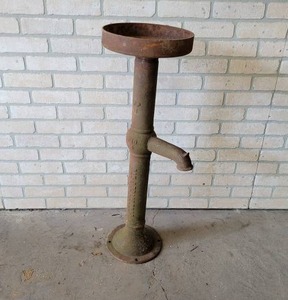 lot 665 image: Outdoor Iron Plant Stand - Made from BAKER MFG Water Pump - Stands about 36 Tall and Top Diameter is 11