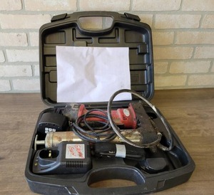 lot 675 image: Legacy Model L1380 12V Cordless Grease Gun in Case w Charger and 2 Batteries