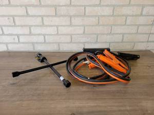 lot 700 image: New Lug Nut Wrench and Heavy Duty Pair of Jumper Cables