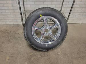 lot 790 image: Michelin P235-65R17 Tire on Chrome Rim - Rim is 17x7.5 and 5x4-34 - Good Tread