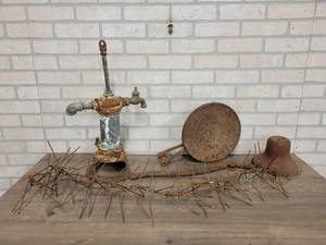 lot 797 image: Antique Well Pump Head and More - Steel & Cast Iron Items