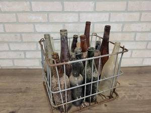 lot 803 image: Lot of Antique Bottles in Metal Crate