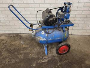 lot 826 image: Vintage Air Compressor - Tank was Originally an Oxygen Tank for Bombers During WW2 Many of them were converted into Air Compressors