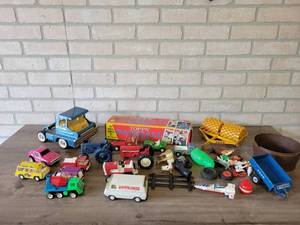 lot 854 image: Large Lot of Vintage Toys - Tonka, Tootsie Toy, Ertl, Structo  Box of Baseball Cards