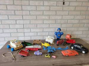 lot 855 image: Large Lot of Vintage Toys - Tonka, Tootsie Toy, Fisher Price and More