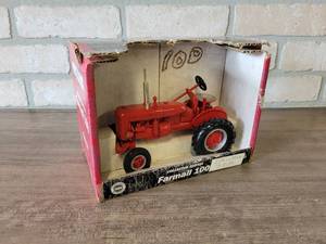 lot 742 image: Farmall 100 Tractor Diecast Model - 116 Scale - ERTL in Box