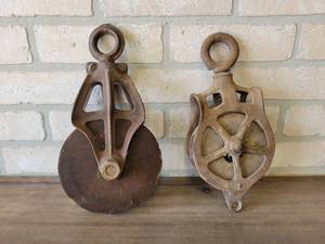 lot 752 image: Pair of Cast Iron and Wood Barn Pulleys - About 11.5 Tall