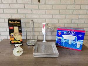 lot 756 image: Lot of Assorted Kitchen Supplies - BRITA Water Pitcher, Mixer, Slicer, Plates and More