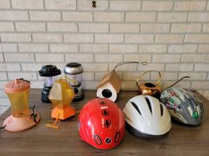 lot 775 image: Lot of Kids Bike Helmets, Bird Feeders, Lanterns and More