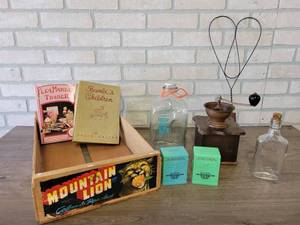 lot 917 image: First National Bank St. Peter MN Plastic Banks, Coffee Grinder, Rug Beater, Hickory Ridge Milk Bottle and More