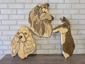 lot 918 image: Lot of (3) Wood Wall Decorations - Dogs and llama - About 20 Tall
