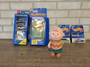 lot 938 image: Lot of Assorted Hot Wheels in Packages and Vintage Charlie Brown - Made in Hong Kong - About 7 Tall