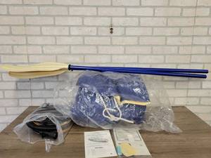 lot 942 image: SEVYLOR Inflatable Boat w Manual Pump  - Unsure of Size