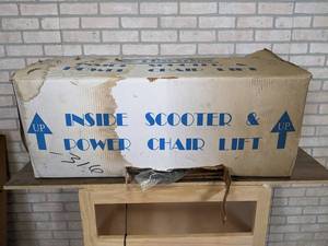 lot 602 image: Harmar AL-055 Scooter and Power Chair Lift - 200lb Capacity