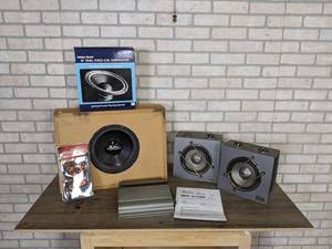 lot 604 image: Vintage Radio Shack 10 Subwoofer (40-1349), (2) Roadmaster 6 Speakers in Boxes, Pioneer Amplifier (Needs Work) and New Set of Pedal Covers