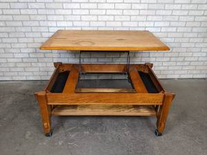 lot 610 image: Raising Top Coffee Table on Wheels - 48 x 25 x 20 - 30 When Raised