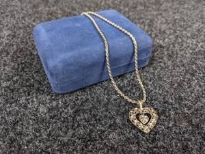 lot 724 image: Sterling Silver 18 Necklace with Beverly Hills Silver Pendant
