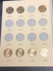 (7) Sacagawea Dollar Coins -- In Ar...