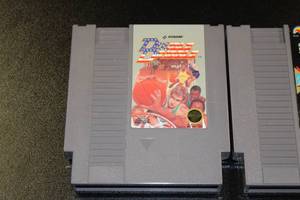 lot 6 image: NES Double Dribble & LJN Toys NFL Power Play Video Game Lot