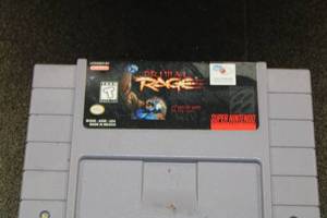 lot 9 image: Super NES Primal Rage & Waialae True Golf Video Game Lot