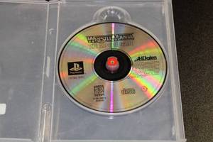 lot 23 image: PS1 Kiss Pinball & WrestleMania Arcade Game Video Game Lot
