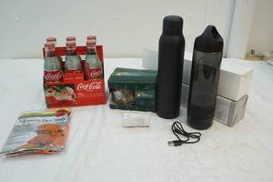 lot 6 image: Neoprene face mask, Terry Redlin coffee mug