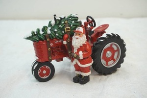 lot 63 image: Farmall Harvest figurine tractor