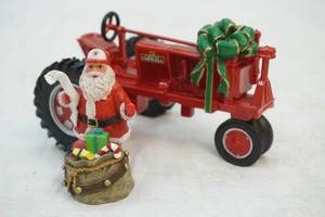 lot 66 image: Farmall Harvest figurine tractor