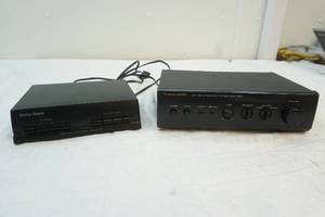 lot 90 image: Realistic integrated stereo amplifier, and Radio Shack amplified audiovideo selector