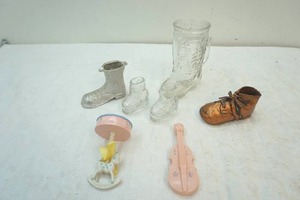 lot 146 image: glass and metal boots, baby rattles