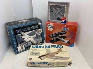 lot 7 image: Group Of Vintage Airplane banks,Model Kit and More