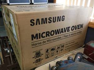 lot 78 image: Samsung Over-The-Range Microwave