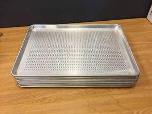 lot 60 image: 12 Aluminum Perforated Bun Pans