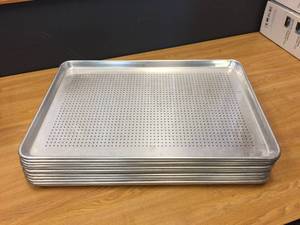 lot 59 image: 12 Aluminum Perforated Bun Pans